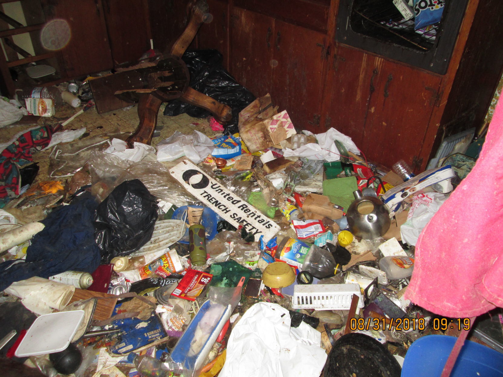 The floor in a Napa hoarder house